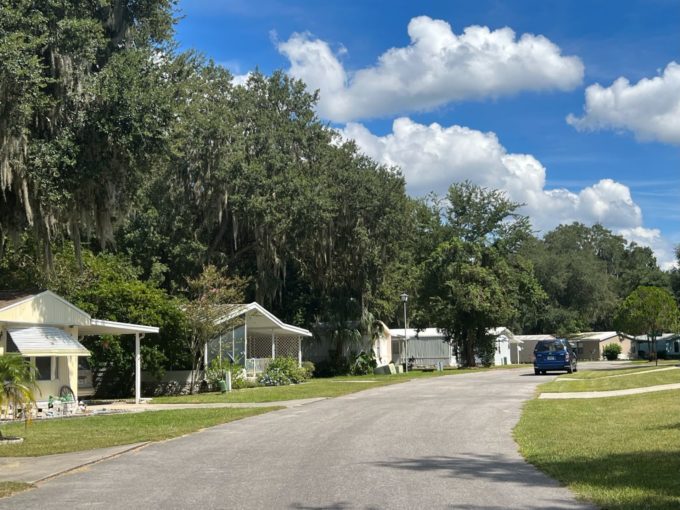 street in picciola landing with grassy lawns and homes